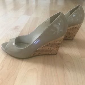 Nude peep-toe wedges